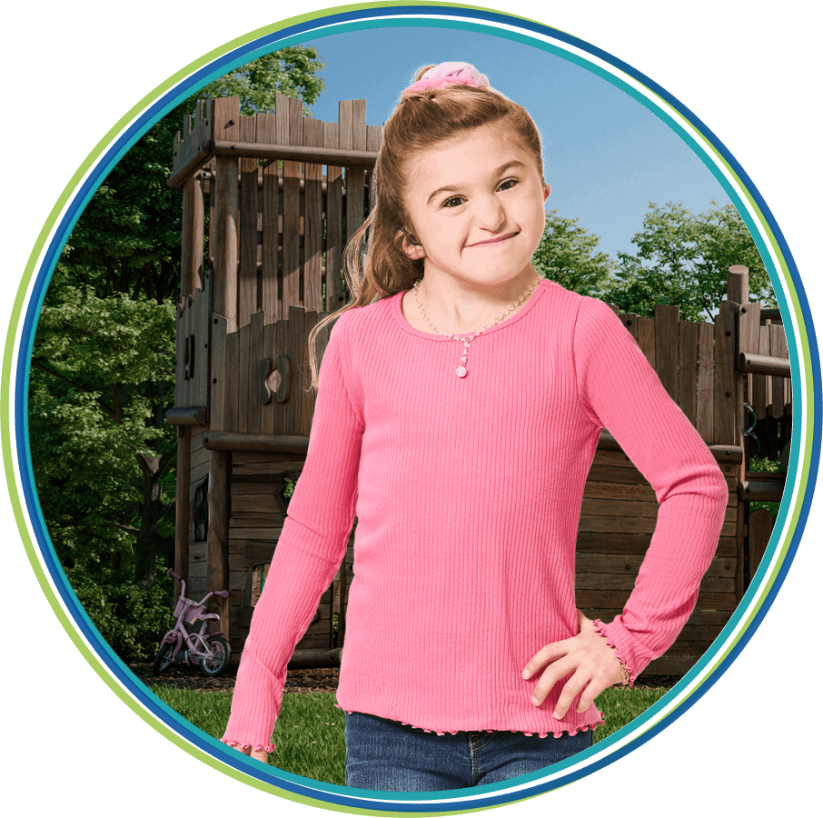 Jada, a child with congenital athymia with shapes of light coming out of her thigh